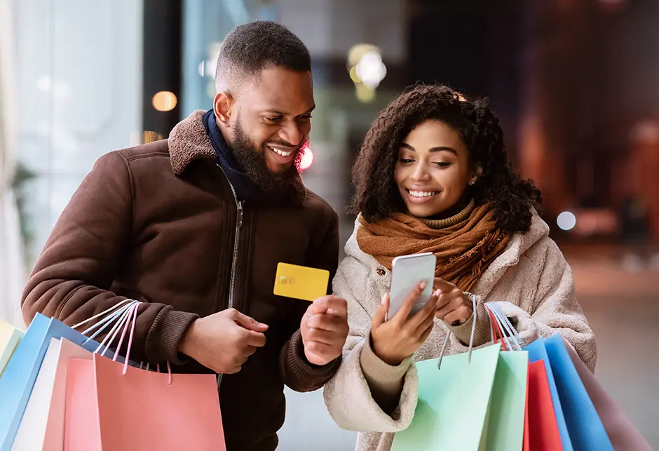 Couple shopping with phone