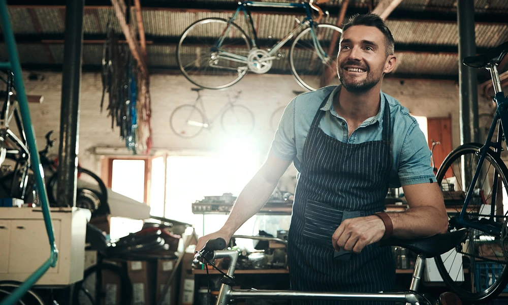 Worker at a bicycle shop